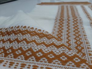 White Kutchi Handcrafted Shawl With Orange Pattern