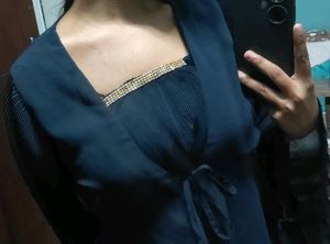Elegant Blue Top with Embellished Neckline