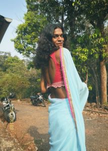 Light Blue Georgette Saree With Pink Border.