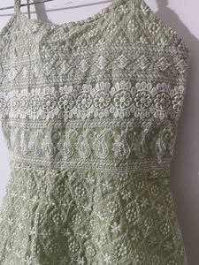 PEPLUM EMBROIDERED SLEEVLESS TOP