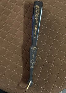Elegant Handheld Decorative Fan with Floral Design