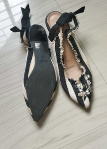Striped  sling back ribbon heel.