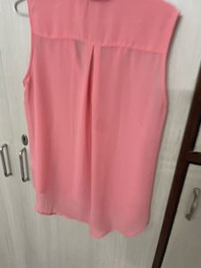 Pink Sleeveless Blouse