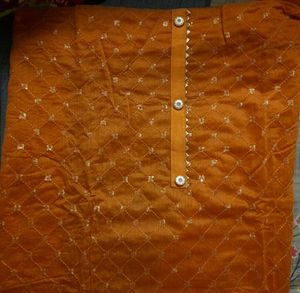 Unstitched Orange Suit