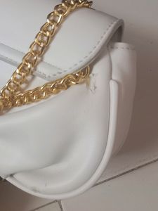 Brand New small sling with gold slin