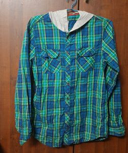 Stylish boys' shirt with an attached hoodie.