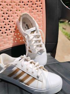 White &amp; Gold Stripe Sneakers