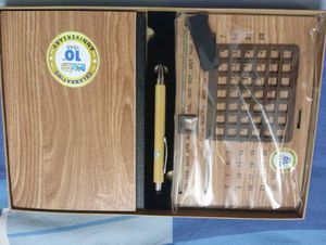 Absolutely new Wooden  Calendar ,pen and a woode