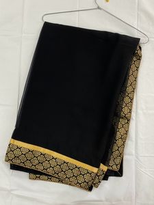 Pretty Black Saree With Golden Border..
