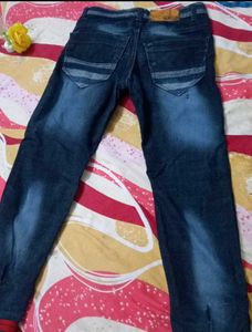 Stylish Jeans with Red Stripe