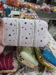 Laces Stones Hand Clutch With Sling
