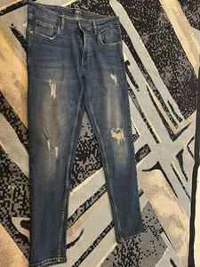 Distressed Denim Jeans