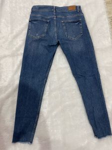 ZARA Ripped Knee Jeans