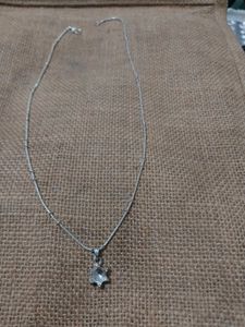 silver color pendant chain and rose gold chai