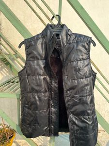 Almost brand new sleeveless black jacket
