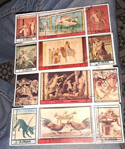 12 Vintage AJMAN painting stamps