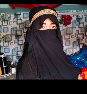 Sana Khan  Elegant Black Hijab with Gold Tr