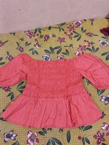 Coral Off-Shoulder Smocked Top