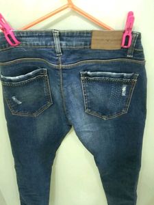 Distressed Denim Jeans
