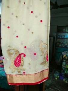 Cream Red Colour Saree With Blouse.