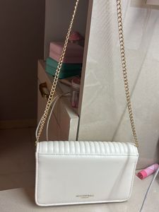 Accessorize london cream gold sling bag
