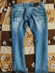 Distressed Denim Jeans