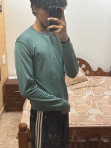 Green long-sleeved shirt