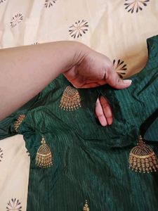 Dark Green Kurta With Golden Jumka Design