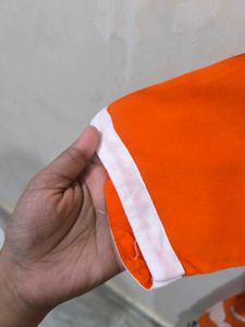 Oraange Boat Neck Kurti.