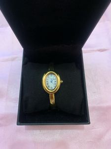 Elegant Gold-Tone Bangle Watch