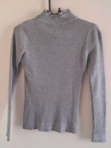 A Grey Turtleneck Top