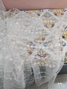 Elegant Embroidered Net Fabric with Fringe