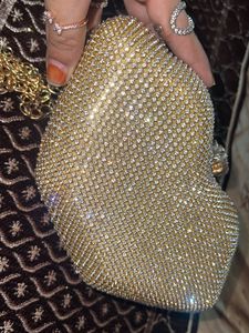 Metro Glamorous Gold-toned Clutch