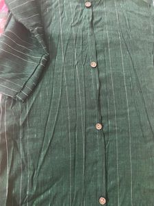 Dark Bottle Green Kurti On Hands Stitches Opened But Not Torn