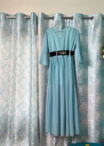 “Elegant Sky Blue Midi Dress with Black Belt”
