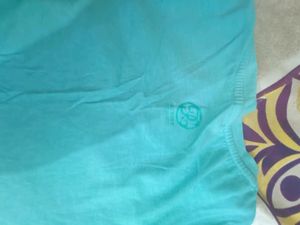 Gym top with slight stains pictures attached