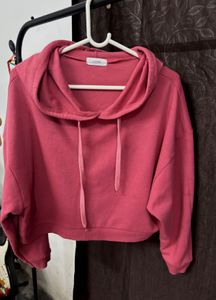 pink cropped length hoodie