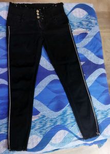 black skinny low waisted jeans with side stripes