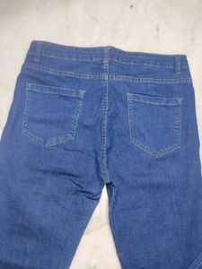 Distressed Blue Denim Jeans