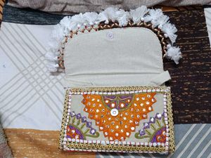 White embroidered jaipuri bags💌