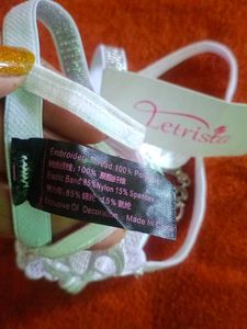 Unisex Lacy White Thong with Charm