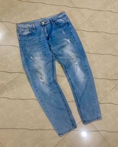 Light Blue Distressed Denim Jeans