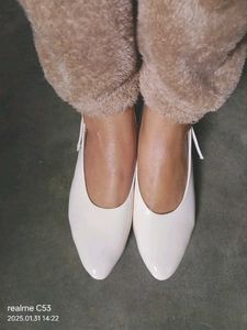 Elegant White Ballerinas