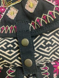 EMBROIDERED BACKPACK
