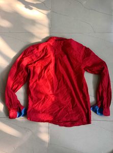 Red Shirt with Blue Accents