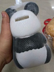 Stuffed teddy and panda piggy bank