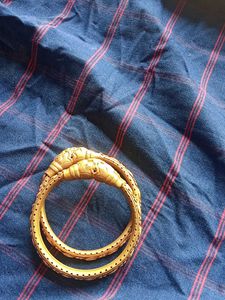 Elegant Gold Tone Bangles - Set of Two