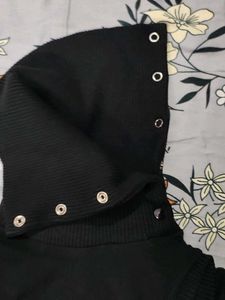 Black Sleeveless Turtleneck Top
