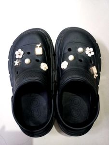 Platform Crocs with charms