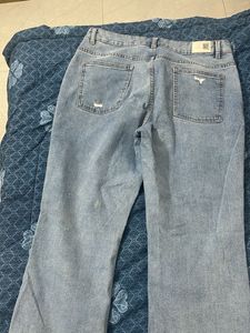 Ripped Flare Jeans